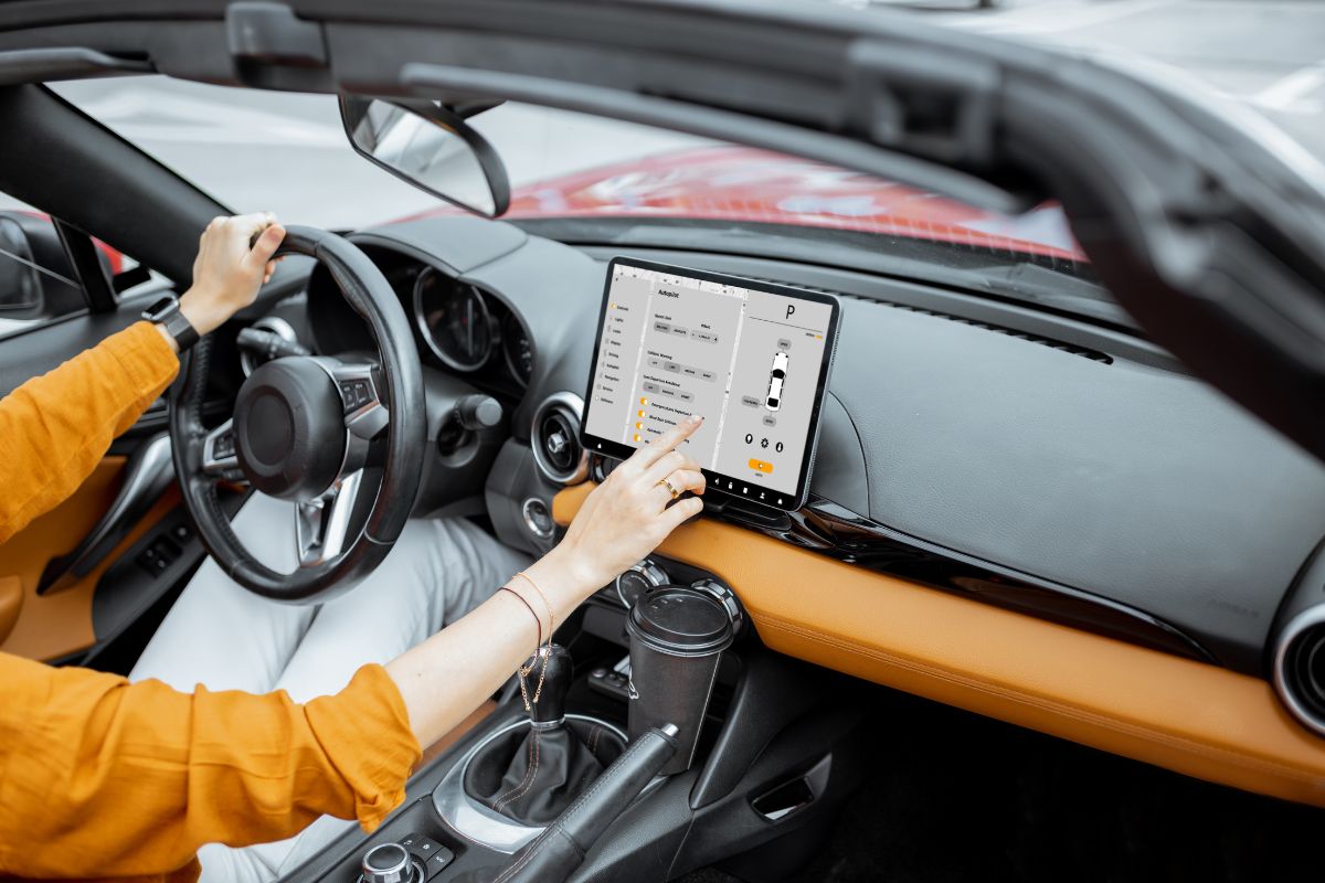 Woman driving confidently after ADAS recalibration and windshield replacement by Affordable Auto Glass in Wisconsin